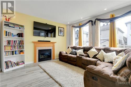 2242 Clendenan Crescent, Ottawa, ON - Indoor Photo Showing Living Room With Fireplace