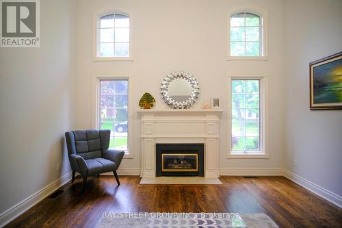 23 Shady Lane, London, ON - Indoor Photo Showing Living Room With Fireplace