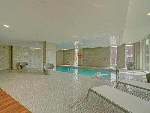 Piscine - 842-5100 Rue Molson, Montréal (Rosemont/La Petite-Patrie), QC - Indoor Photo Showing Other Room With In Ground Pool