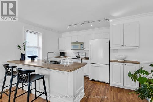 403 - 79 King Street W, Cobourg, ON - Indoor Photo Showing Kitchen With Double Sink
