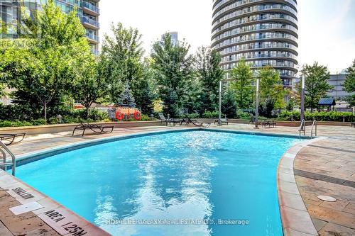 307 - 60 Absolute Avenue, Mississauga, ON - Outdoor With In Ground Pool