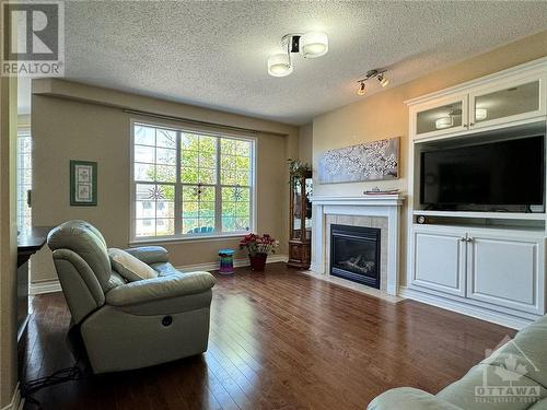 25 Golflinks Drive, Ottawa, ON - Indoor Photo Showing Living Room With Fireplace