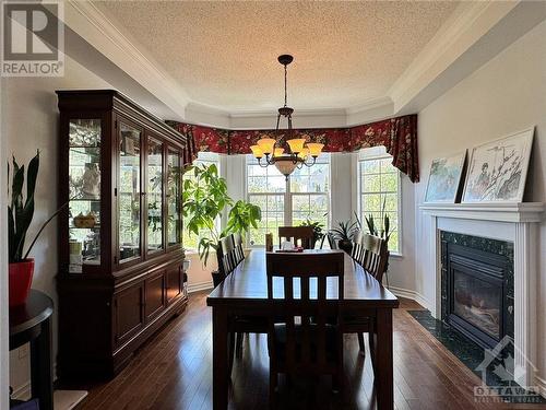 25 Golflinks Drive, Ottawa, ON - Indoor Photo Showing Dining Room With Fireplace