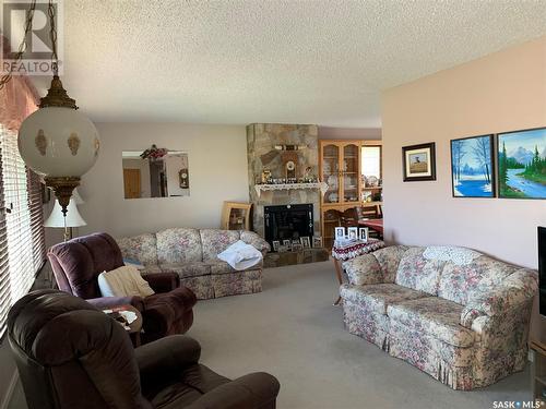 305 Railway Avenue, Midale, SK - Indoor Photo Showing Living Room With Fireplace