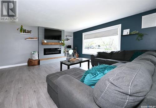 1490 Nicholson Road, Estevan, SK - Indoor Photo Showing Living Room With Fireplace