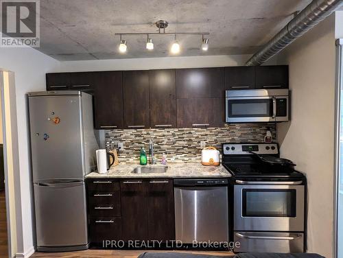711 - 170 Sudbury Street, Toronto, ON - Indoor Photo Showing Kitchen With Upgraded Kitchen