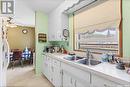 1516 G Avenue N, Saskatoon, SK  - Indoor Photo Showing Kitchen With Double Sink 