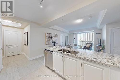207 - 25 Baker Hill Boulevard, Whitchurch-Stouffville, ON - Indoor Photo Showing Kitchen With Upgraded Kitchen