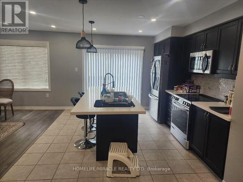 34 - 1125 Leger Way, Milton, ON - Indoor Photo Showing Kitchen With Stainless Steel Kitchen