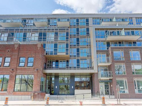 321-150 Logan Ave, Toronto, ON - Outdoor With Balcony With Facade