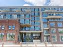 321-150 Logan Ave, Toronto, ON  - Outdoor With Balcony With Facade 