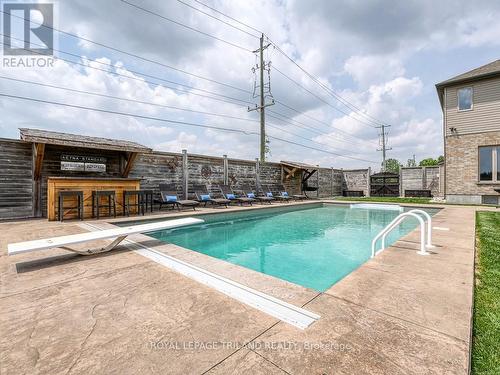 2 Elliott Trail, Thames Centre, ON - Outdoor With In Ground Pool