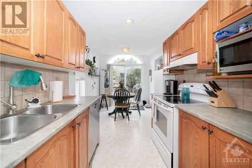 26 Wimbledon Way, Ottawa, ON - Indoor Photo Showing Kitchen With Double Sink