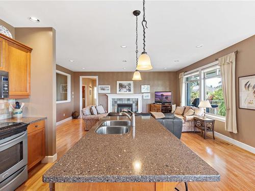 2240 Leighton Rd, Nanaimo, BC - Indoor Photo Showing Kitchen With Fireplace With Double Sink