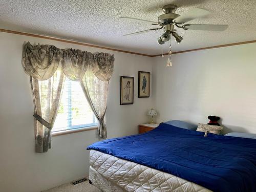 16 - 1500 Neimi Road, Christina Lake, BC - Indoor Photo Showing Bedroom