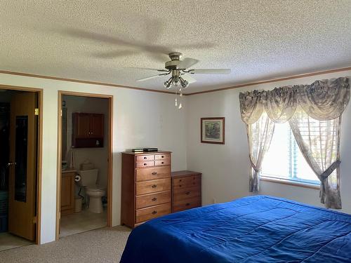 16 - 1500 Neimi Road, Christina Lake, BC - Indoor Photo Showing Bedroom