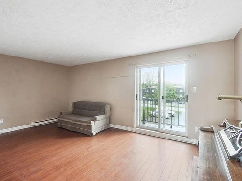 Living room - 6-830 Rue Hélène-Boullé, Boucherville, QC - Indoor Photo Showing Other Room