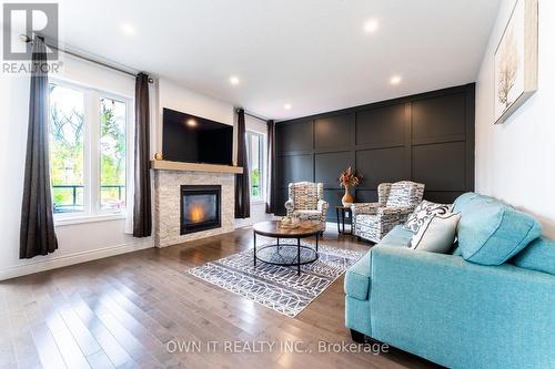 267 Wedgewood Drive, Woodstock, ON - Indoor Photo Showing Living Room With Fireplace