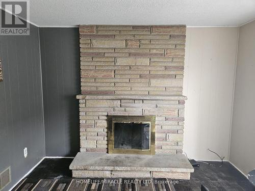 22 Major Oaks Drive, Brampton, ON - Indoor Photo Showing Living Room With Fireplace