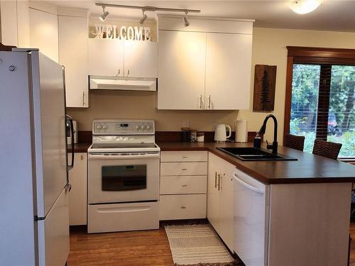 219 Sunningdale Rd East, Qualicum Beach, BC - Indoor Photo Showing Kitchen With Double Sink