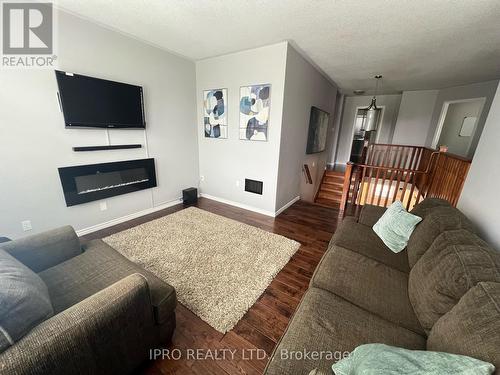 18 Tawnberry Circle, Brampton, ON - Indoor Photo Showing Living Room With Fireplace
