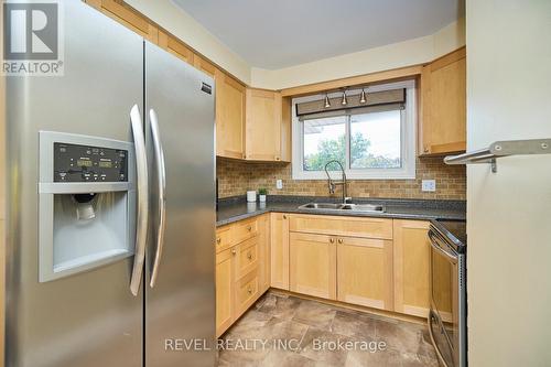 139 Woodrow Street, St. Catharines, ON - Indoor Photo Showing Kitchen With Double Sink
