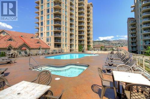 1128 Sunset Drive Drive Unit# 407, Kelowna, BC - Outdoor With In Ground Pool With Balcony With Facade