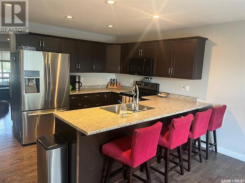 537 L Avenue N, Saskatoon, SK - Indoor Photo Showing Kitchen With Double Sink