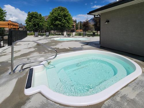 611A - 600 Bighorn Boulevard, Radium Hot Springs, BC - Outdoor With In Ground Pool