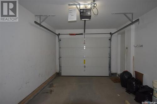 104 4601 Child Avenue, Regina, SK - Indoor Photo Showing Garage