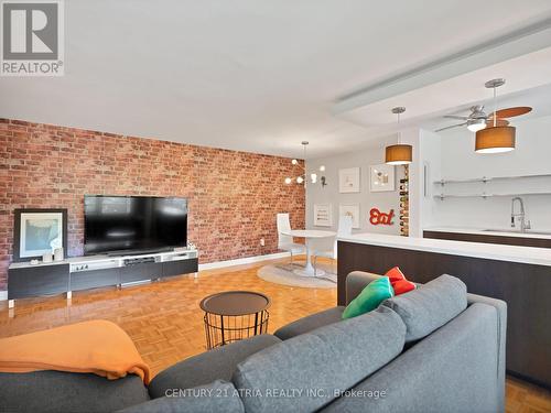 210 - 175 Hilda Avenue, Toronto, ON - Indoor Photo Showing Living Room