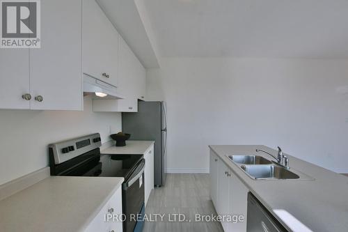 12 Shapira Avenue, Wasaga Beach, ON - Indoor Photo Showing Kitchen With Double Sink