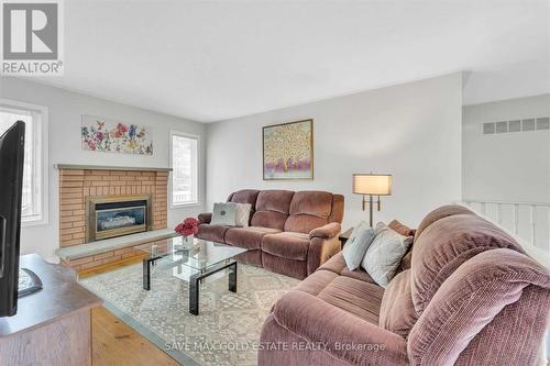 85 Cityview Circle, Barrie (Holly), ON - Indoor Photo Showing Living Room With Fireplace