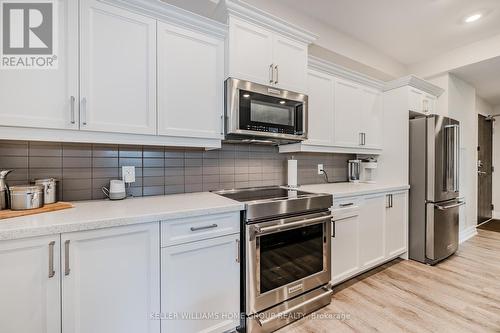 223 - 3290 New Street, Burlington (Roseland), ON - Indoor Photo Showing Kitchen With Stainless Steel Kitchen