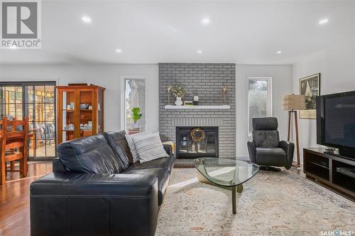 354 Marcotte Crescent, Saskatoon, SK - Indoor Photo Showing Living Room With Fireplace