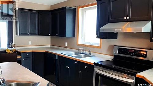 540 5Th Avenue, Hudson Bay, SK - Indoor Photo Showing Kitchen With Double Sink