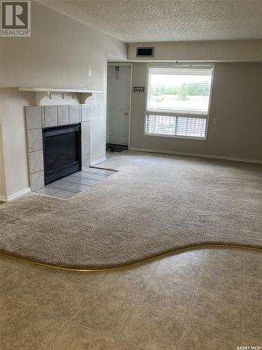 156 Gore Place, Regina, SK - Indoor Photo Showing Other Room With Fireplace