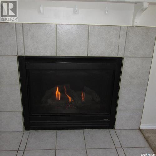 156 Gore Place, Regina, SK - Indoor With Fireplace