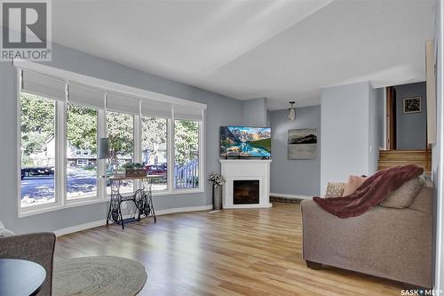 30 Dewar Bay, Regina, SK - Indoor Photo Showing Living Room With Fireplace