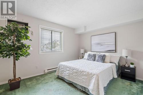 A/C wall unit in bedroom - 103 - 729 Deveron Crescent, London, ON - Indoor Photo Showing Bedroom