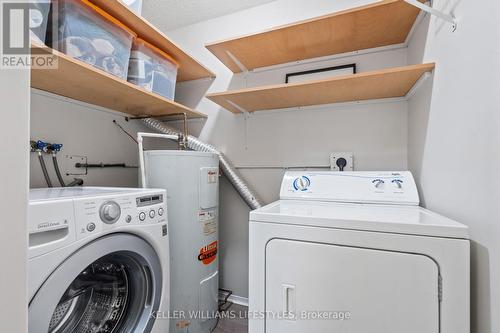 In suite laundry with extra storage - 103 - 729 Deveron Crescent, London, ON - Indoor Photo Showing Laundry Room