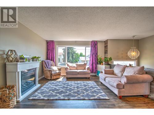 1303 28Th Avenue, Vernon, BC - Indoor Photo Showing Living Room With Fireplace