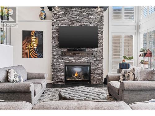 2496 Loseth Road, Kelowna, BC - Indoor Photo Showing Living Room With Fireplace