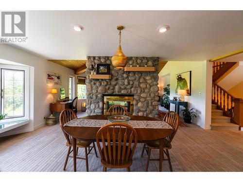 4625 Crescent View  Drive, Nelson, BC - Indoor Photo Showing Dining Room With Fireplace