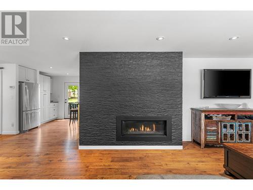 3155 Mathews Road, Kelowna, BC - Indoor Photo Showing Living Room With Fireplace