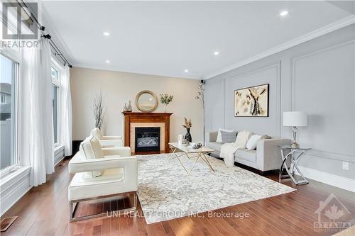 100 Brambling Way, Ottawa, ON - Indoor Photo Showing Living Room With Fireplace