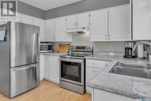 54 Fuhrmann Crescent, Regina, SK - Indoor Photo Showing Kitchen With Double Sink