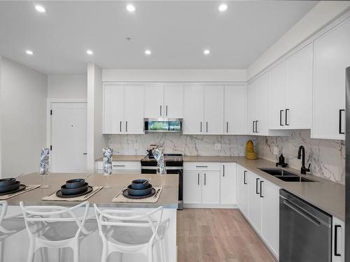 106-1371 Goldstream Ave, Langford, BC - Indoor Photo Showing Kitchen With Double Sink