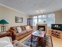 103-1663 Mckenzie Ave, Saanich, BC  - Indoor Photo Showing Living Room With Fireplace 