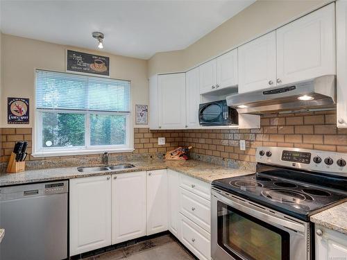 103-1663 Mckenzie Ave, Saanich, BC - Indoor Photo Showing Kitchen With Double Sink